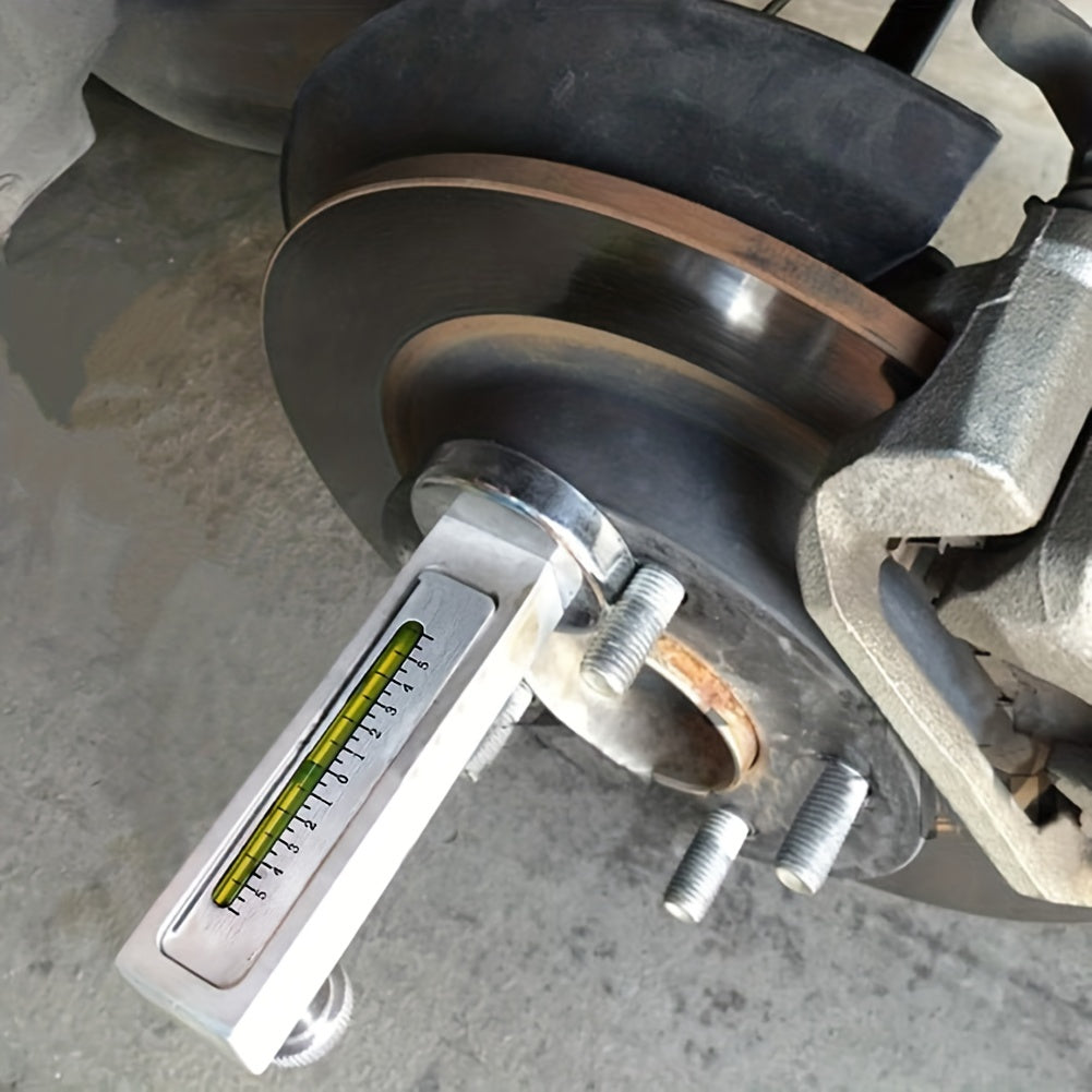 Automotive wheel alignment magnetic level